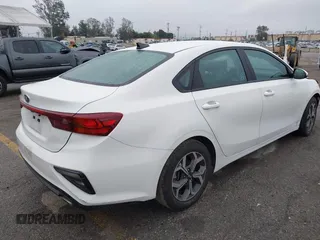 2021 Kia Forte LXS with VIN 3KPF24AD8ME332309, listed as a IAAI auction lot 41885851 with 27,395 mi miles. Bid and sale history available at carsss.com. Image 4.