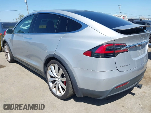 2016 Tesla Model X P90D with VIN 5YJXCAE49GF001067, listed as a IAAI auction lot 41980455 with 94,746 mi miles. Bid and sale history available at carsss.com. Image 3.