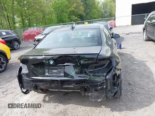 2021 BMW M2 Competition z VIN WBS2U7C05M7J18701, wystawiony jako IAAI lot #42256735 z przebiegiem 12 976 mil mil oraz . Historia ofert i sprzedaży dostępna na DreamBid. Obrazek 17.