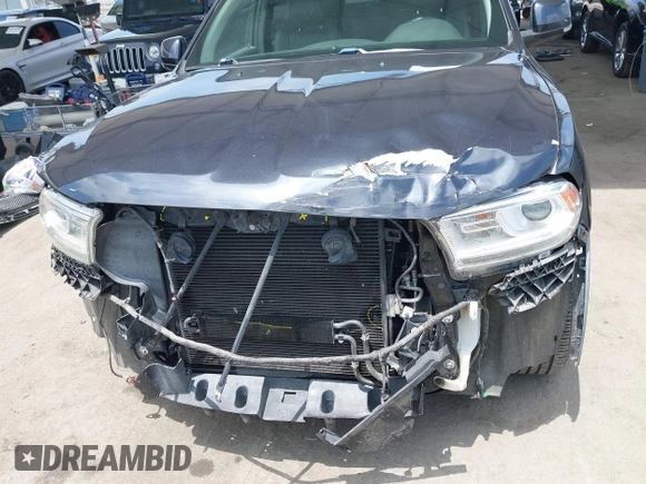 2014 Dodge Durango Limited with VIN 1C4RDHDG6EC975934, listed as a IAAI auction lot 42416833 with 158,266 mi miles and . Bid and sale history available at DreamBid. Image 6.