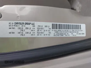 2014 Chrysler Town & Country Touring with VIN 2C4RC1BG2ER212233, listed as a IAAI auction lot 41836648 with 105,034 mi miles. Bid and sale history available at carsss.com. Image 9.