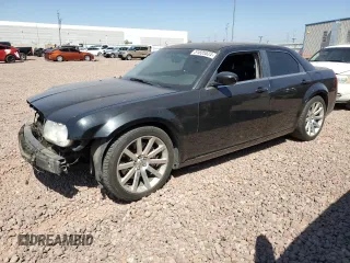 2006 Chrysler 300 C SRT8 with VIN 2C3LA73W96H417614, listed as a Copart auction lot 51835524 with 153,575 mi miles and Salvage Title. Bid and sale history available at carsss.com. Image 1.