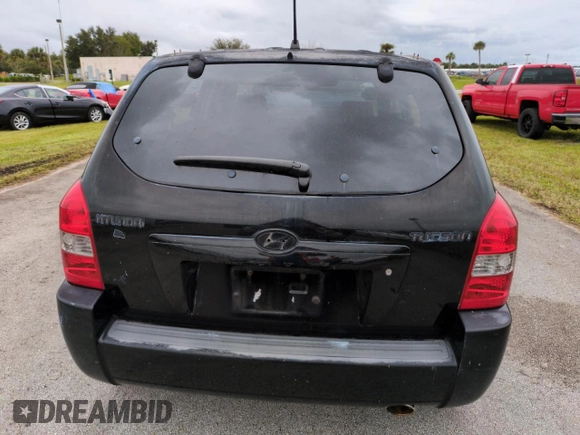 2005 Hyundai Tucson GL with VIN KM8JM12BX5U071182, listed as a Copart auction lot 74852974 with 74,235 mi miles and Salvage Title. Bid and sale history available at carsss.com. Image 6.