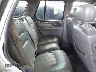 2004 GMC Envoy SLT with VIN 1GKDS13S942267554, listed as a IAAI auction lot 41754066 with 178,895 mi miles. Bid and sale history available at carsss.com. Image 8.
