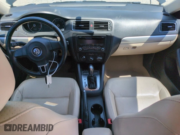 2013 Volkswagen Jetta SE with VIN 3VWDX7AJ8DM292073, listed as a Copart auction lot 59989585 with 129,697 mi miles and Salvage title. Bid and sale history available at DreamBid. Image 8.