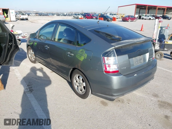 2004 Toyota Prius with VIN JTDKB20U640034581, listed as a IAAI auction lot 41895908 with 213,708 mi miles. Bid and sale history available at carsss.com. Image 3.