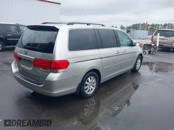2008 Honda Odyssey EX with VIN 5FNRL38418B101360, listed as a IAAI auction lot 41862629 with 235,653 mi miles. Bid and sale history available at carsss.com. Image 4.