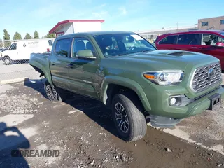 2021 Toyota Tacoma SR with VIN 3TMCZ5AN7MM395940, listed as a IAAI auction lot 41240832 with 39,338 mi miles and . Bid and sale history available at DreamBid. Image 6.