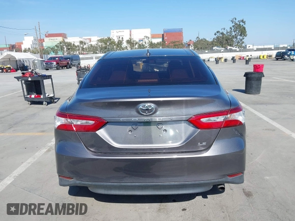 2019 Toyota Camry LE with VIN 4T1B11HK2KU240465, listed as a IAAI auction lot 42095075 with 67,852 mi miles and . Bid and sale history available at DreamBid. Image 17.