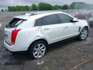 2015 Cadillac SRX Performance Collection with VIN 3GYFNFE35FS613177, listed as a IAAI auction lot 42102352 with Not provided miles and . Bid and sale history available at DreamBid. Image 4.