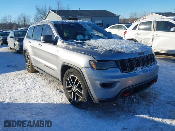 2017 Jeep Grand Cherokee Trailhawk with VIN 1C4RJFLT4HC657682, listed as a IAAI auction lot 41286507 with 123,646 mi miles and . Bid and sale history available at DreamBid. Image 1.