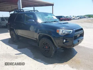 2021 Toyota 4Runner TRD Pro z VIN JTELU5JR5M5893914, wystawiony jako IAAI lot #42514093 z przebiegiem 96 366 mil mil oraz . Historia ofert i sprzedaży dostępna na DreamBid. Obrazek 1.