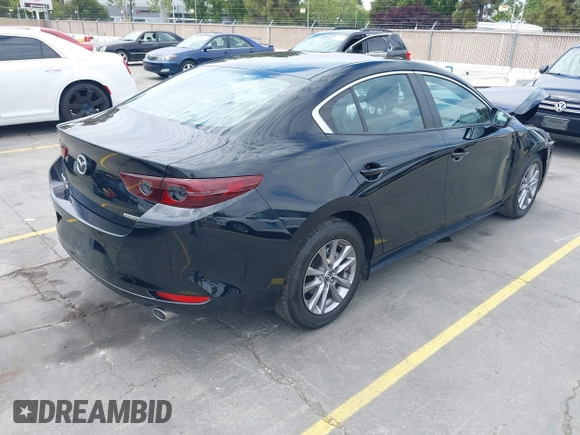 2021 Mazda 3 S with VIN 3MZBPAAL8MM254767, listed as a IAAI auction lot 42813614 with 31,704 mi miles and . Bid and sale history available at DreamBid. Image 4.