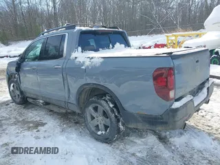2022 Honda Ridgeline RTL-E with VIN 5FPYK3F73NB035246, listed as a IAAI auction lot 41532768 with 37,116 mi miles and . Bid and sale history available at DreamBid. Image 3.