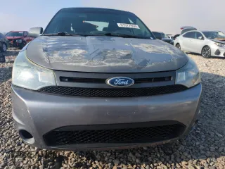 2011 Ford Focus SES with VIN 1FAHP3GNXBW108570, listed as a Copart auction lot 81977954 with 147,563 mi miles and Salvage Title. Bid and sale history available at carsss.com. Image 5.