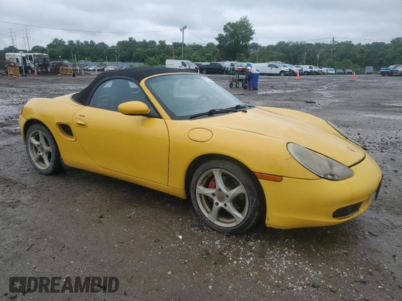 2002 Porsche Boxster with VIN WP0CA29802U623712, listed as a Copart auction lot 60972405 with 99,584 mi miles and Salvage title. Bid and sale history available at DreamBid. Image 4.