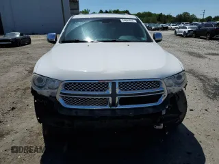 2013 Dodge Durango Citadel с VIN 1C4SDJET0DC512576, выставлен на аукционе Copart как лот 54809835 с пробегом 190 455 миль миль и Списание • Salvage title. История ставок и продаж доступна на DreamBid. Изображение 5.