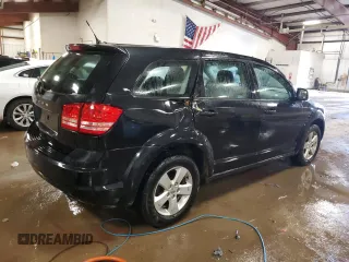 2013 Dodge Journey American Value with VIN 3C4PDCABXDT502334, listed as a Copart auction lot 58428235 with 162,009 mi miles and Clean title. Bid and sale history available at DreamBid. Image 3.