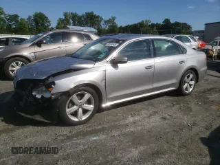 2013 Volkswagen Passat SE with VIN 1VWBH7A3XDC022012, listed as a Copart auction lot 60499945 with 173,700 mi miles and Salvage title. Bid and sale history available at DreamBid. Image 1.