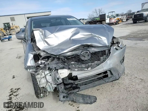 2015 Mazda CX-5 Touring with VIN JM3KE4CY4F0467571, listed as a Copart auction lot 88919035 with 197,755 mi miles and Salvage Title. Bid and sale history available at carsss.com. Image 11.