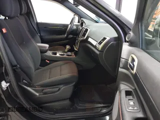 2016 Jeep Grand Cherokee 75th Anniversary z VIN 1C4RJFAG8GC476475, wystawiony jako IAAI lot #41509557 z przebiegiem 94 621 mil mil oraz . Historia ofert i sprzedaży dostępna na DreamBid. Obrazek 5.