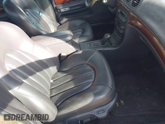 2000 Chrysler 300M M with VIN 2C3HE66G2YH325451, listed as a IAAI auction lot 41680818 with 161,976 mi miles and . Bid and sale history available at DreamBid. Image 5.
