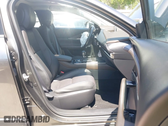 2022 Mazda CX-30 S Premium with VIN 3MVDMBDL5NM416649, listed as a IAAI auction lot 41990745 with 13,923 mi miles and . Bid and sale history available at DreamBid. Image 5.