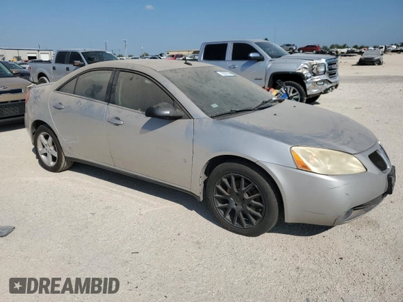 2008 Pontiac G6 z VIN 1G2ZG57N184198212, wystawiony jako Copart lot #70977674 z przebiegiem 118 154 mil mil oraz Czysty tytuł • Clean title. Historia ofert i sprzedaży dostępna na DreamBid. Obrazek 4.