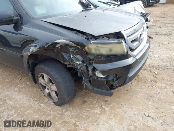 2011 Honda Pilot EX-L with VIN 5FNYF3H69BB043509, listed as a IAAI auction lot 41127719 with 241,167 mi miles and . Bid and sale history available at DreamBid. Image 6.