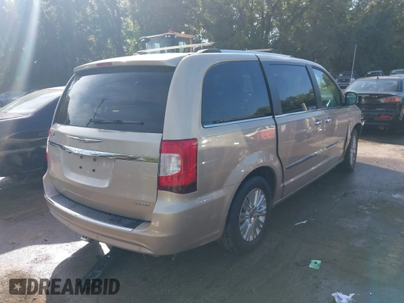 2015 Chrysler Town & Country Limited Platinum with VIN 2C4RC1GGXFR619209, listed as a IAAI auction lot 40366234 with 163,649 mi miles. Bid and sale history available at carsss.com. Image 4.
