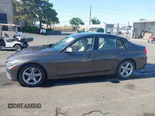 2014 BMW 3 Series 328i with VIN WBA3C1C57EK116483, listed as a IAAI auction lot 42697759 with 113,010 mi miles and . Bid and sale history available at DreamBid. Image 15.