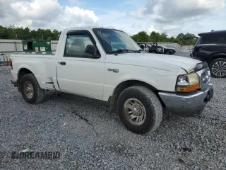 1999 Ford Ranger XL with VIN 1FTYR10C6XPA43770, listed as a Copart auction lot 63831315 with 18,858 mi miles and Salvage title. Bid and sale history available at DreamBid. Image 4.