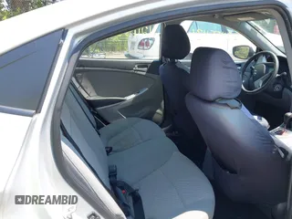 2014 Hyundai Accent GLS z VIN KMHCT4AE1EU637366, wystawiony jako IAAI lot #42455436 z przebiegiem 121 764 mil mil oraz . Historia ofert i sprzedaży dostępna na DreamBid. Obrazek 8.