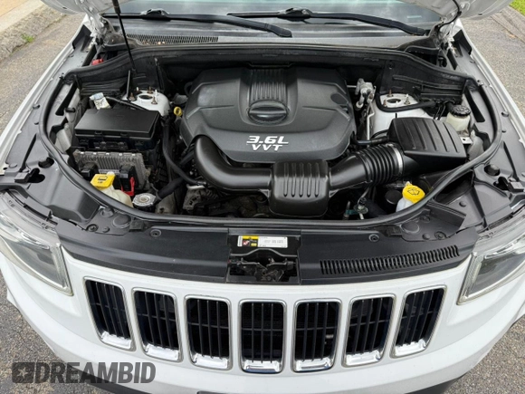 2014 Jeep Grand Cherokee Limited with VIN 1C4RJFBG9EC155122, listed as a Copart auction lot 63812735 with 164,061 mi miles and Clean title. Bid and sale history available at DreamBid. Image 7.
