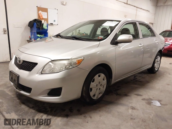 2009 Toyota Corolla with VIN 1NXBU40E69Z129314, listed as a IAAI auction lot 41718098 with 170,739 mi miles. Bid and sale history available at carsss.com. Image 2.