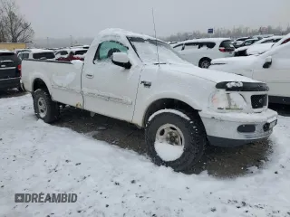 1998 Ford F-150 with VIN 1FTRF18L9WNB61551, listed as a Copart auction lot 82864544 with Not provided miles and Salvage title. Bid and sale history available at DreamBid. Image 4.