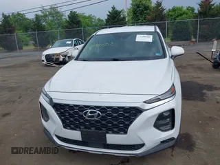 2019 Hyundai Santa Fe SE with VIN 5NMS23AD7KH111542, listed as a IAAI auction lot 42430502 with 78,755 mi miles and . Bid and sale history available at DreamBid. Image 12.