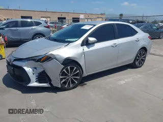 2019 Toyota Corolla L with VIN 5YFBURHE5KP877691, listed as a IAAI auction lot 42108591 with 85,813 mi miles and . Bid and sale history available at DreamBid. Image 2.