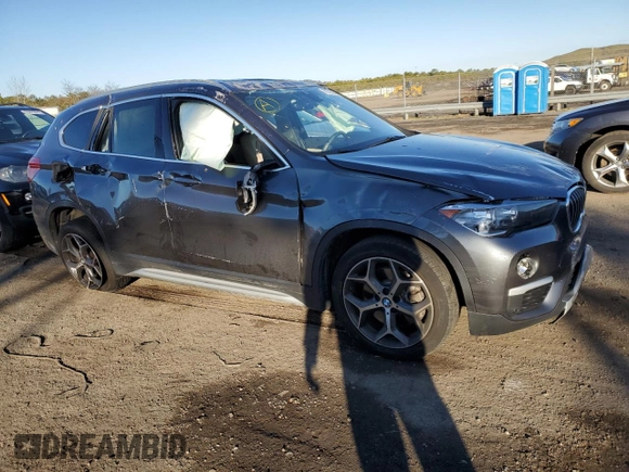 2019 BMW X1 xDrive28i with VIN WBXHT3C50K3H35538, listed as a Copart auction lot 70726232 with 27,847 mi miles. Bid and sale history available at carsss.com. Image 4.