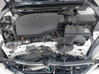 2015 Acura TLX Technology z VIN 19UUB2F57FA022382, wystawiony jako IAAI lot #42340632 z przebiegiem 92 529 mil mil oraz . Historia ofert i sprzedaży dostępna na DreamBid. Obrazek 10.