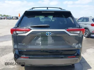 2021 Toyota RAV4 Hybrid XSE with VIN 2T3E6RFV8MW026973, listed as a IAAI auction lot 42052289 with 94,857 mi miles and . Bid and sale history available at DreamBid. Image 16.