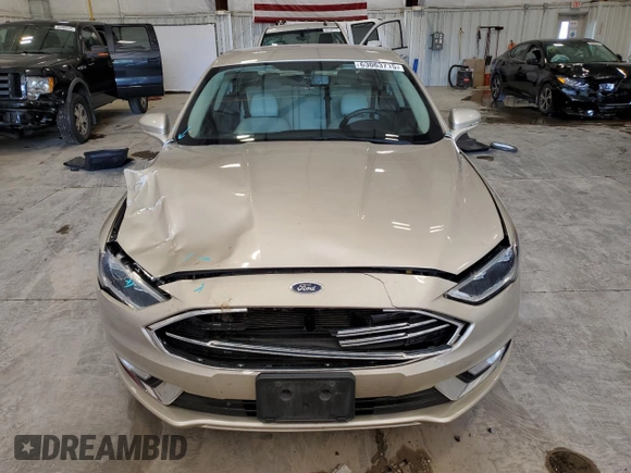 2017 Ford Fusion Hybrid Titanium with VIN 3FA6P0RU3HR360053, listed as a Copart auction lot 63063715 with 127,534 mi miles and Non repairable. Bid and sale history available at DreamBid. Image 5.