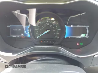 2015 Ford Fusion SE Hybrid with VIN 3FA6P0LUXFR296373, listed as a IAAI auction lot 42600980 with 76,985 mi miles and . Bid and sale history available at DreamBid. Image 7.