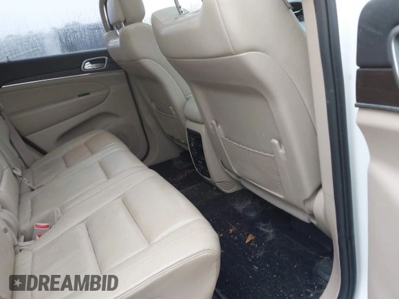 2018 Jeep Grand Cherokee Limited with VIN 1C4RJFBG8JC245999, listed as a IAAI auction lot 42345499 with 90,670 mi miles and . Bid and sale history available at DreamBid. Image 8.