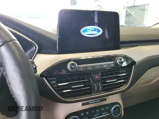 2020 Ford Escape SEL z VIN 1FMCU9H60LUB74495, wystawiony jako IAAI lot #42634880 z przebiegiem 39 530 mil mil oraz . Historia ofert i sprzedaży dostępna na DreamBid. Obrazek 23.