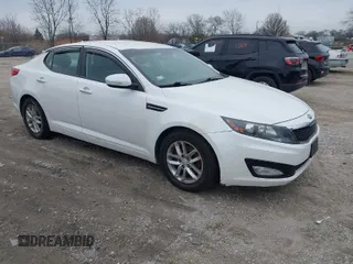 2013 Kia Optima LX with VIN KNAGM4A76D5379047, listed as a IAAI auction lot 41973373 with 135,454 mi miles. Bid and sale history available at carsss.com. Image 1.