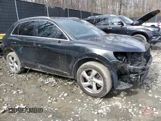 2020 Audi Q3 Premium with VIN WA1AECF30L1025756, listed as a Copart auction lot 50295125 with 77,389 mi miles and Salvage title. Bid and sale history available at DreamBid. Image 4.