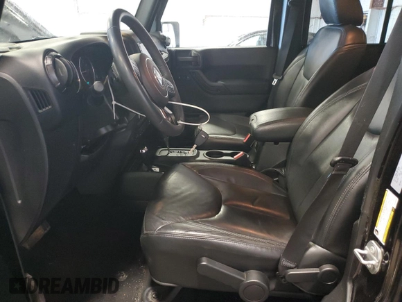2017 Jeep Wrangler Unlimited Sahara with VIN 1C4HJWEG9HL639562, listed as a Copart auction lot 55074445 with 112,225 mi miles and Salvage title. Bid and sale history available at DreamBid. Image 7.