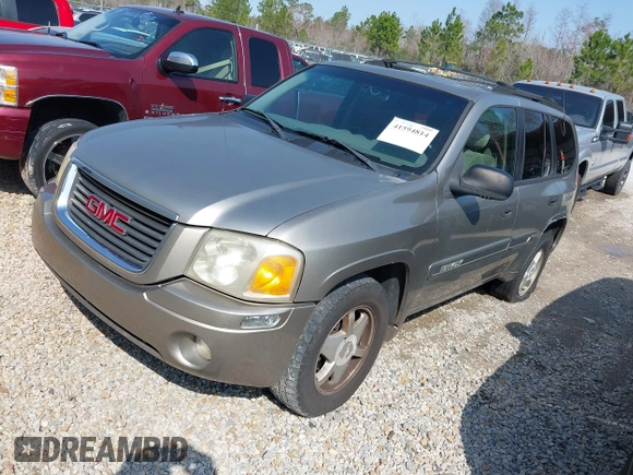 2003 GMC Envoy SLT z VIN 1GKDS13S932106295, wystawiony jako IAAI lot #41594814 z przebiegiem 199 597 mil mil oraz . Historia ofert i sprzedaży dostępna na DreamBid. Obrazek 2.