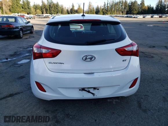 2016 Hyundai Elantra GT with VIN KMHD35LH0GU318979, listed as a Copart auction lot 77449704 with 100,229 mi miles and Salvage Title. Bid and sale history available at carsss.com. Image 6.
